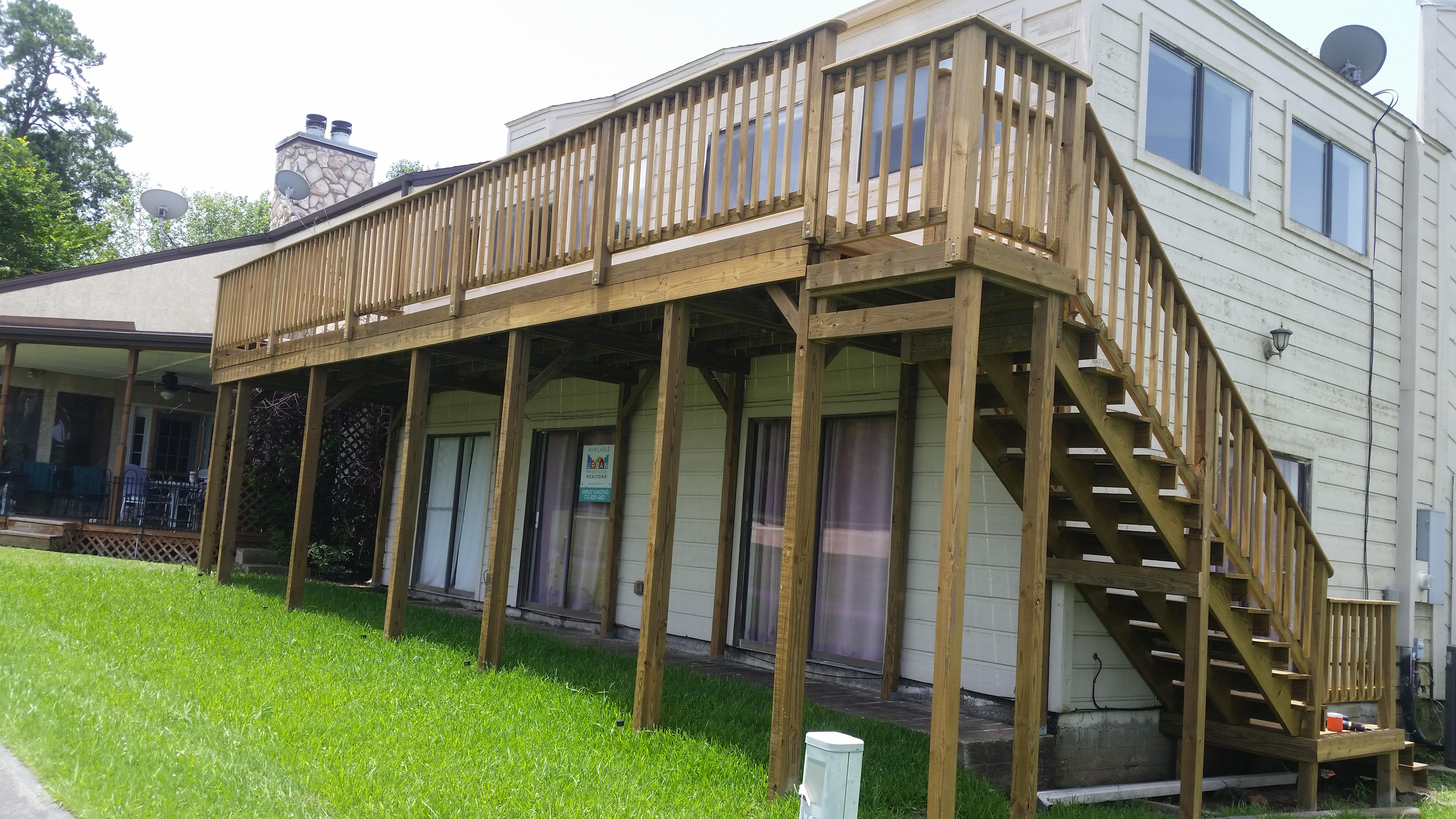 Outdoor wood stairs built by Cavalier Custom Decks